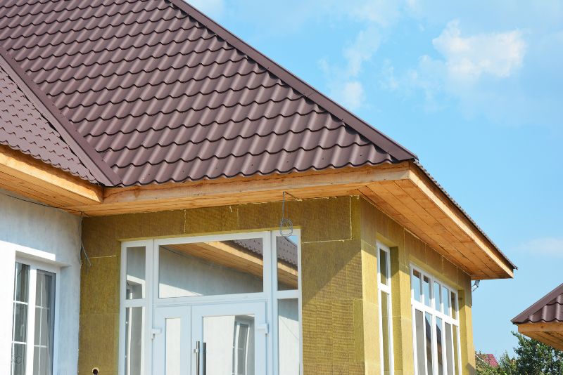 New timber roof eaves and tiled roofing installed during a home renovation