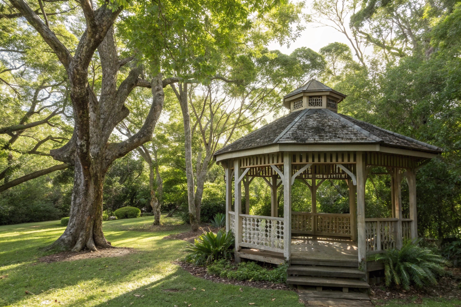 Traditional timber gazebo construction in established Queensland garden